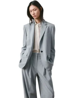 Pantalon bleu gris uni avec une coupe bootcut et une braguette zippée