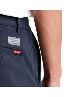 Pantalon bleu marine en coton uni avec poches avant et poches passepoilées arrière