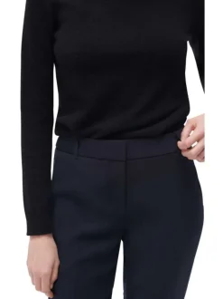 Pantalon bleu marine uni à coupe fuselée avec poches et fermeture zippée