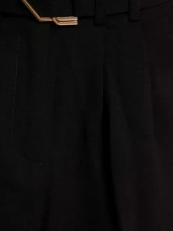 Pantalon Cargo noir uni avec une coupe ample, poches cargo et ceinture à boucle