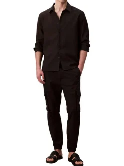 Pantalon cargo noir uni à coupe slim et à ourlets élastiqués