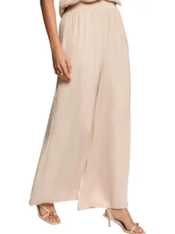 Pantalon chino beige clair uni avec une coupe large et de multiples poches