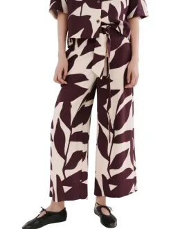Pantalon chino beige à motifs pourvu d'une coupe large et d'une taille haute