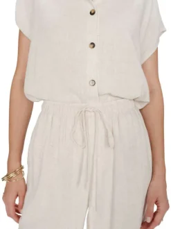 Pantalon chino beige uni avec une coupe flare et une taille élastiquée