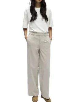 Pantalon chino beige uni pourvu d'une coupe bootcut et d'une taille haute