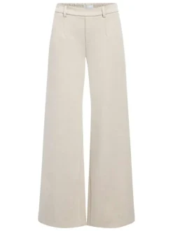 Pantalon chino beige uni pourvu d'une coupe bootcut et d'une taille haute