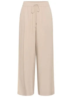 Pantalon chino beige uni pourvu d'une coupe bootcut et d'une taille haute