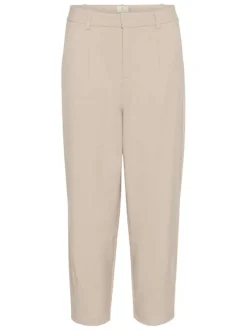 Pantalon chino beige uni taille haute pourvu d'une coupe ajustée