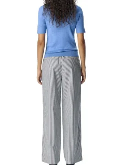 Pantalon chino blanc à rayures pourvu d'une coupe bootcut et d'une taille haute