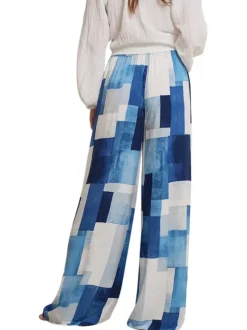 Pantalon chino bleu avec des motifs à carreaux et une coupe bootcut