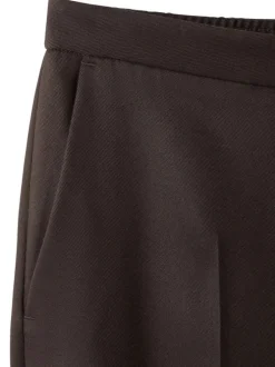 Pantalon chino chocolat uni pourvu d'une coupe large et d'une taille haute