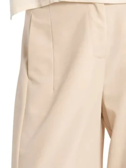 Pantalon chino écru uni pourvu d'une coupe large et d'une taille haute