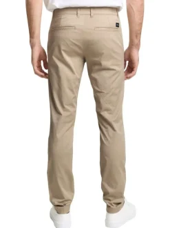 Pantalon chino en coton beige avec une coupe slim et une taille intermédiaire