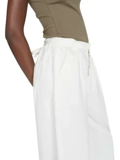 Pantalon chino en coton blanc uni à coupe large avec un bouton et un zip