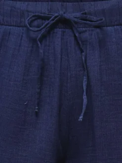 Pantalon chino en coton marine uni pourvu d'une taille élastiquée