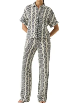 Pantalon chino en coton mélangé écru à motifs pourvu d'une coupe bootcut