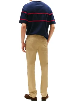 Pantalon Chino en coton moutarde à coupe slim avec logo de la marque