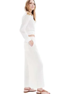 Pantalon chino en lin blanc uni avec une coupe flare et une taille élastiquée