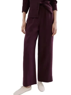 Pantalon chino en lin bordeaux uni pourvu d'une coupe large