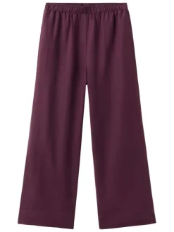 Pantalon chino en lin bordeaux uni pourvu d'une coupe large