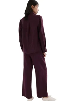 Pantalon chino en lin bordeaux uni pourvu d'une coupe large