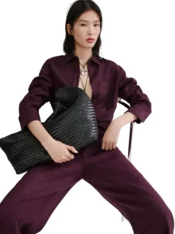 Pantalon chino en lin bordeaux uni pourvu d'une coupe large