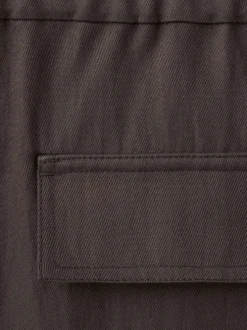 Pantalon chino en lin marron uni pourvu d'une coupe bootcut