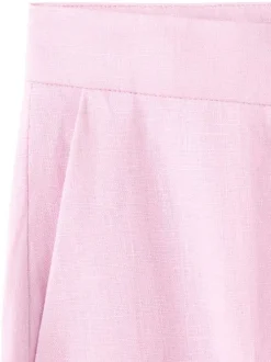 Pantalon chino en lin rose uni pourvu d'une taille intermédiaire