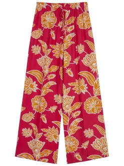 Pantalon chino fuchsia à motifs pourvu d'une taille élastiquée