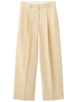 Pantalon chino jaune uni pourvu d'une coupe bootcut et d'une taille haute
