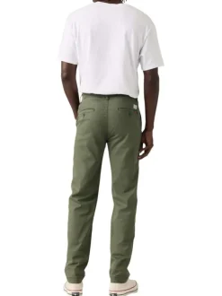 Pantalon chino kaki à coupe slim pourvu du patch de la marque