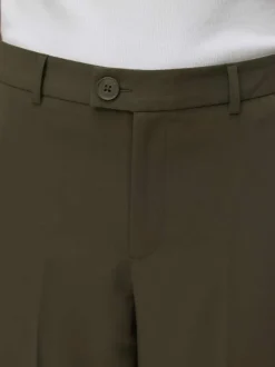 Pantalon Chino kaki uni avec une coupe bootcut et bouton à la taille