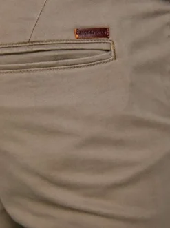 Pantalon chino Marco beige uni en coton avec une coupe slim et des poches