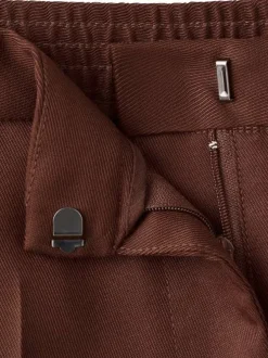 Pantalon chino marron uni pourvu d'une coupe large et d'une taille haute