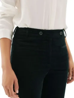 Pantalon Chino noir en maille côtelée pourvu d'une coupe bootcut
