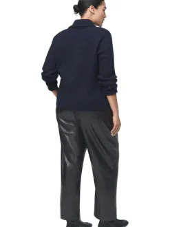 Pantalon chino noir en simili cuir pourvu d'une taille élastiquée