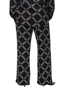 Pantalon chino noir à motifs géométriques imprimés avec une coupe ample
