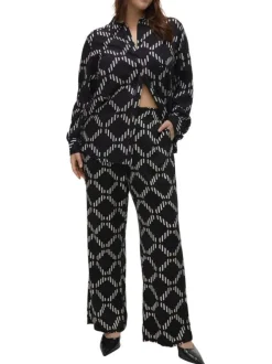 Pantalon chino noir à motifs géométriques imprimés avec une coupe ample