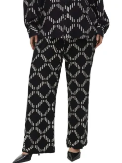 Pantalon chino noir à motifs géométriques imprimés avec une coupe ample