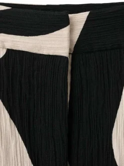 Pantalon chino noir à motifs pourvu d'une coupe droite et d'une taille haute