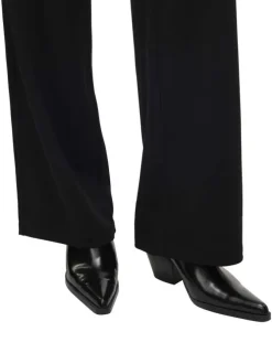 Pantalon chino noir uni avec une coupe bootcut et une fermeture zippée