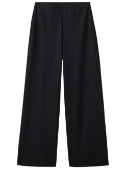 Pantalon chino noir uni pourvu d'une coupe bootcut et d'une taille haute