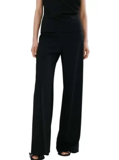 Pantalon chino noir uni pourvu d'une coupe bootcut et d'une taille haute