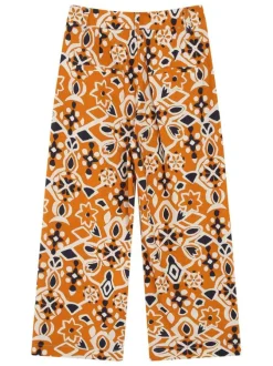 Pantalon chino orange en coton avec des motifs géométriques et une coupe flare