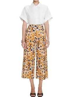 Pantalon chino orange en coton avec des motifs géométriques et une coupe flare