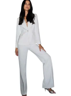 Pantalon chino à plis blanc pourvu d'une coupe bootcut et d'une taille haute
