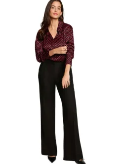 Pantalon chino à plis noir pourvu d'une coupe bootcut et d'une taille haute