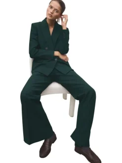 Pantalon Chino sapin pourvu d'une coupe flare et d'une taille élastiquée