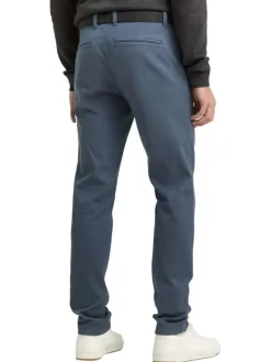 Pantalon Chino Traveler en coton bleu uni avec une coupe slim