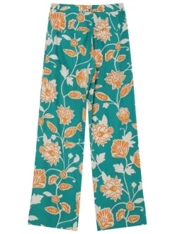 Pantalon chino vert avec des motifs floraux et une coupe flare